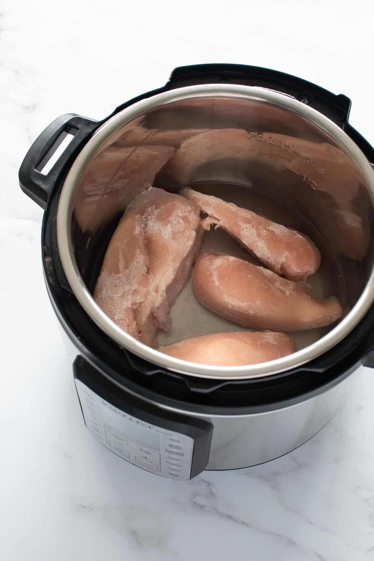 Frozen chicken breast in an instant pot.