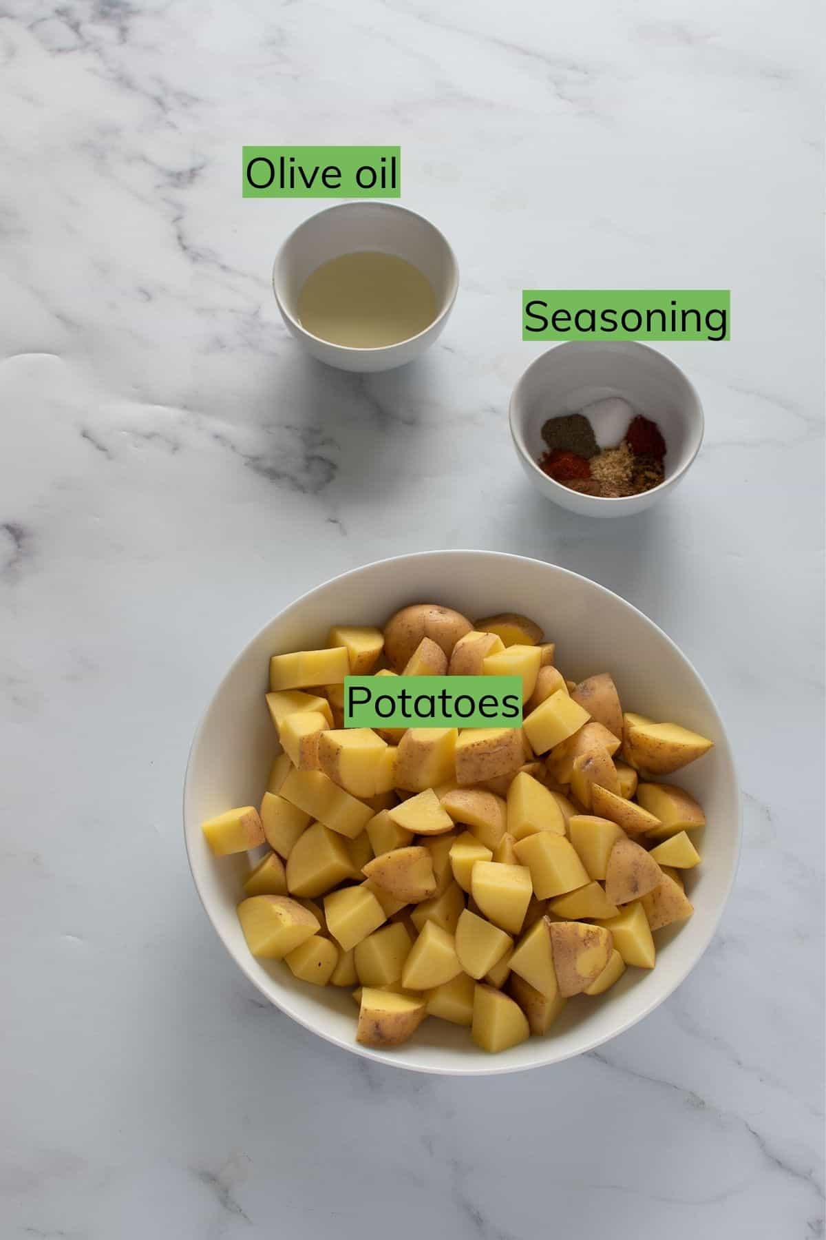 Ingredients for Mexican potatoes laid out on a table.