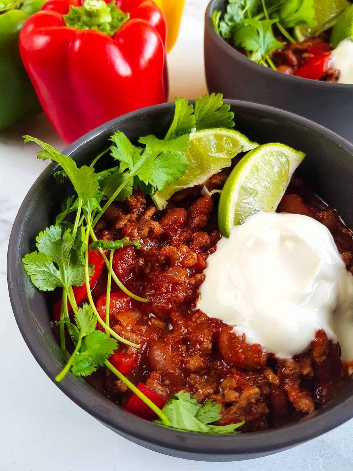 Slow cooker chilli topped with Greek yogurt.