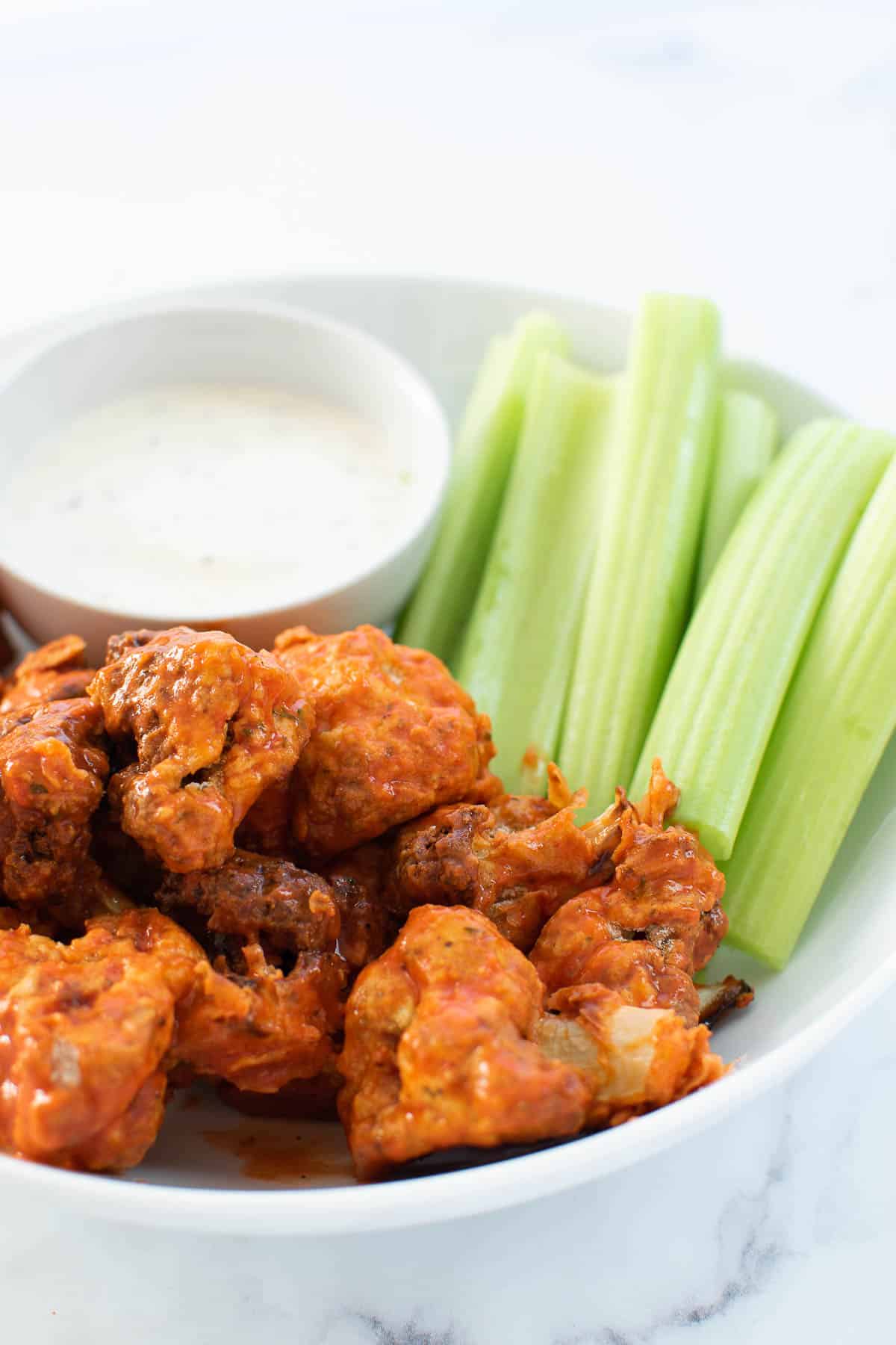 Buffalo cauliflower wings served with ranch.