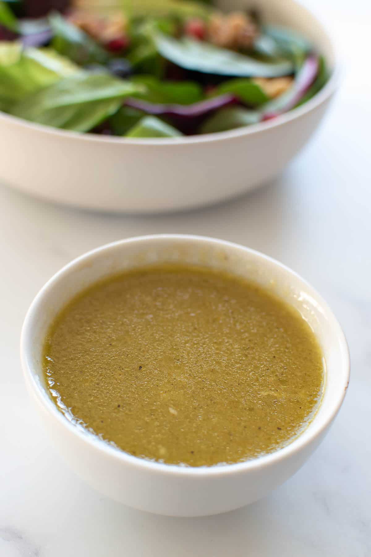 Fresh dressing with apple cider vinegar in a bowl.