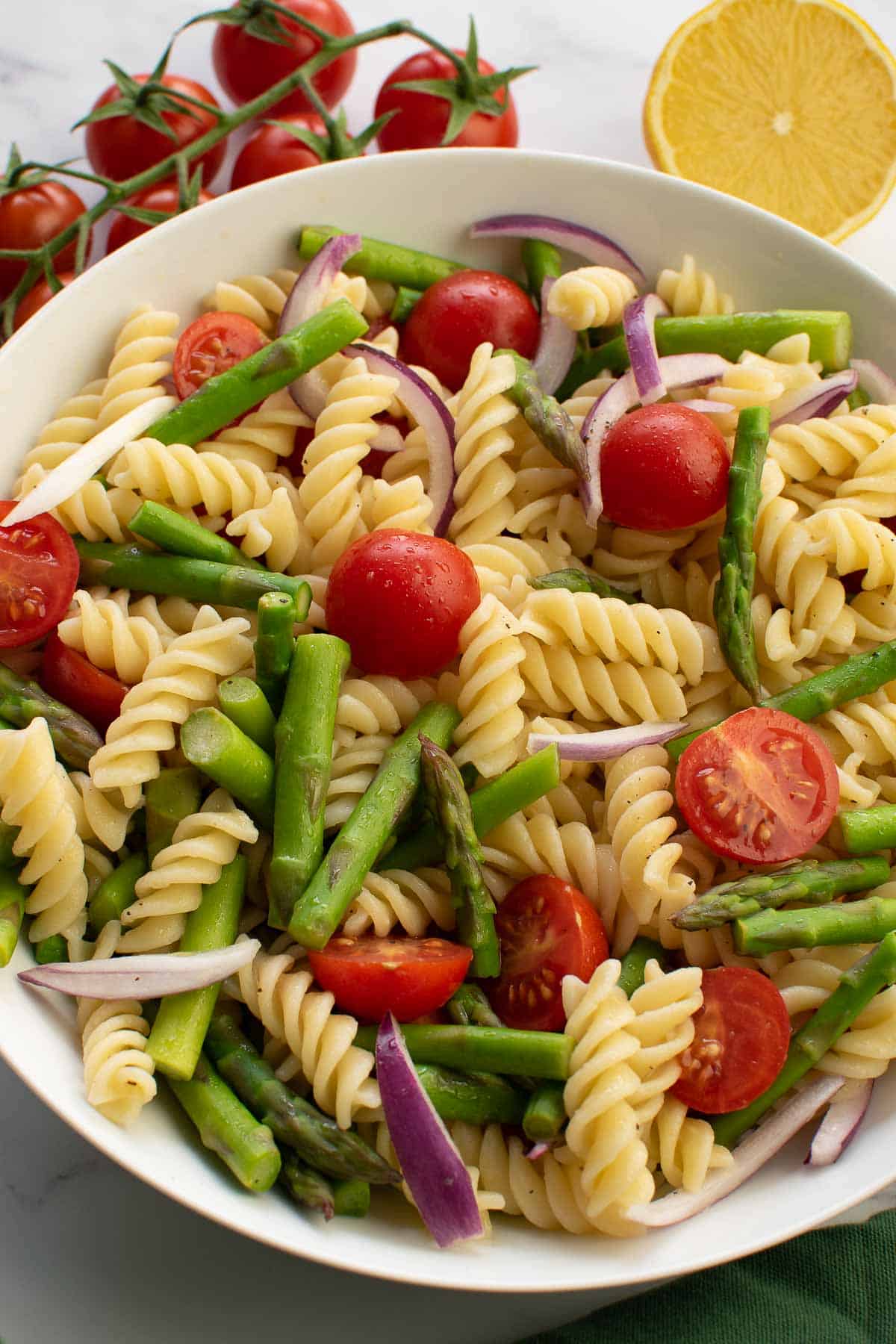 Asparagus pasta salad in a bowl.