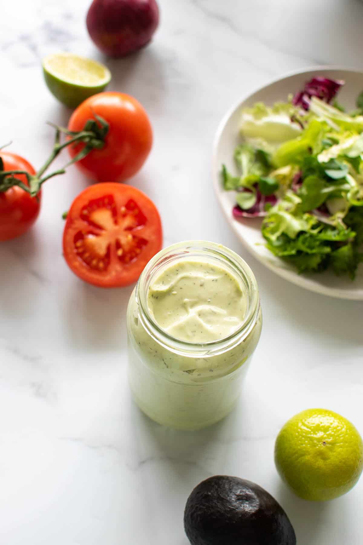 Mason jar with homemade avocado ranch dressing.