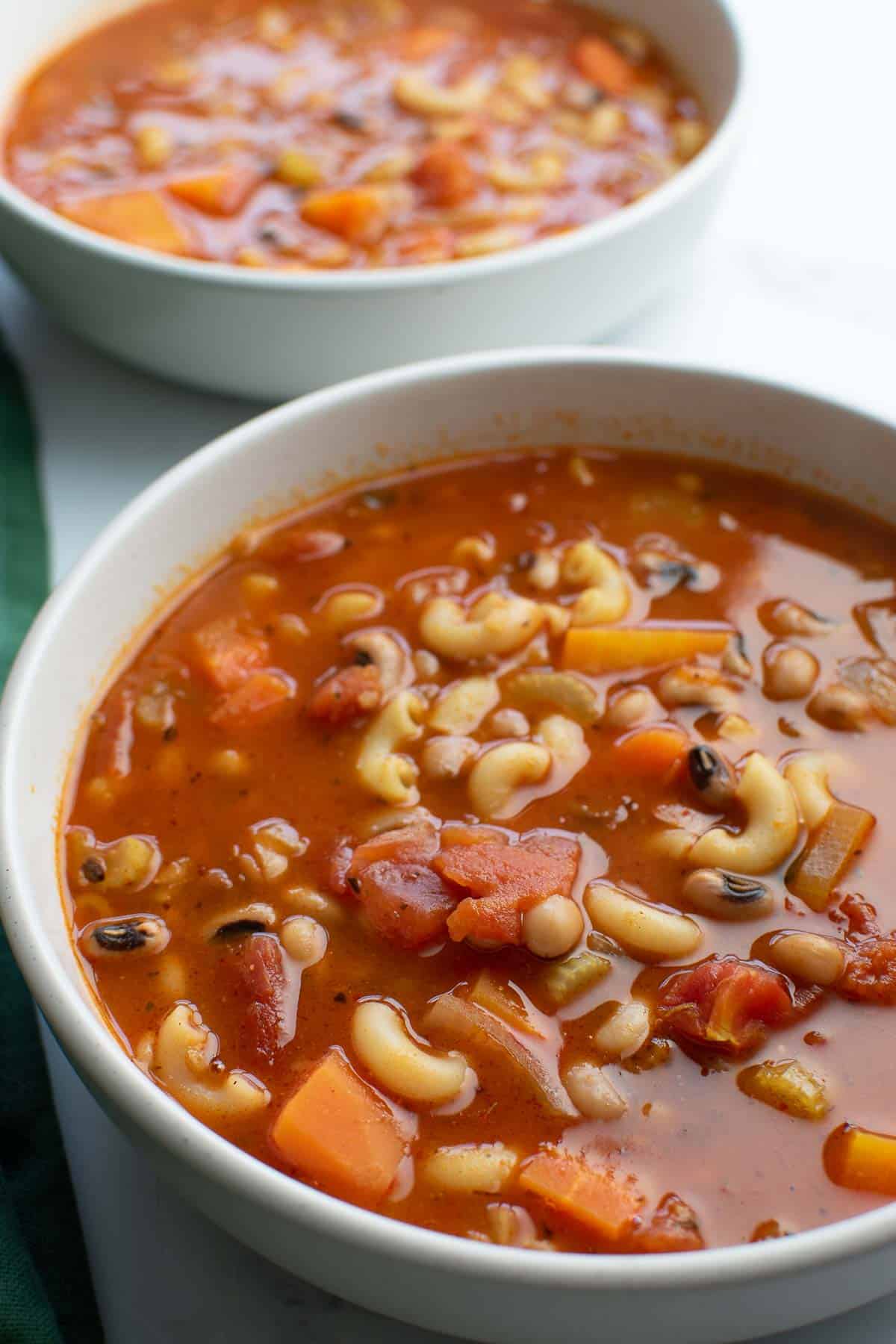 A bowl with black eyed pea soup.