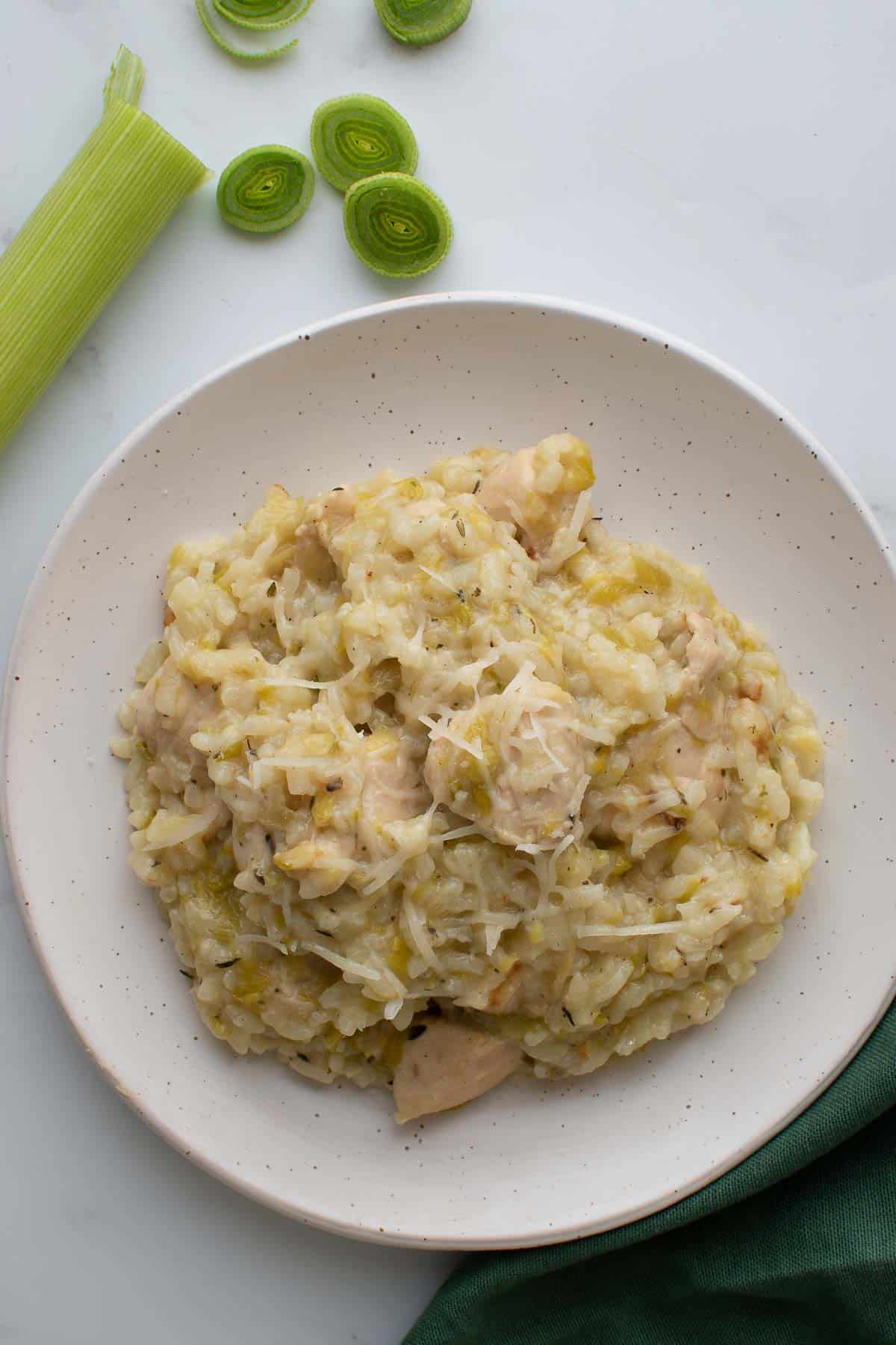 Risotto with chicken and leek on a plate.