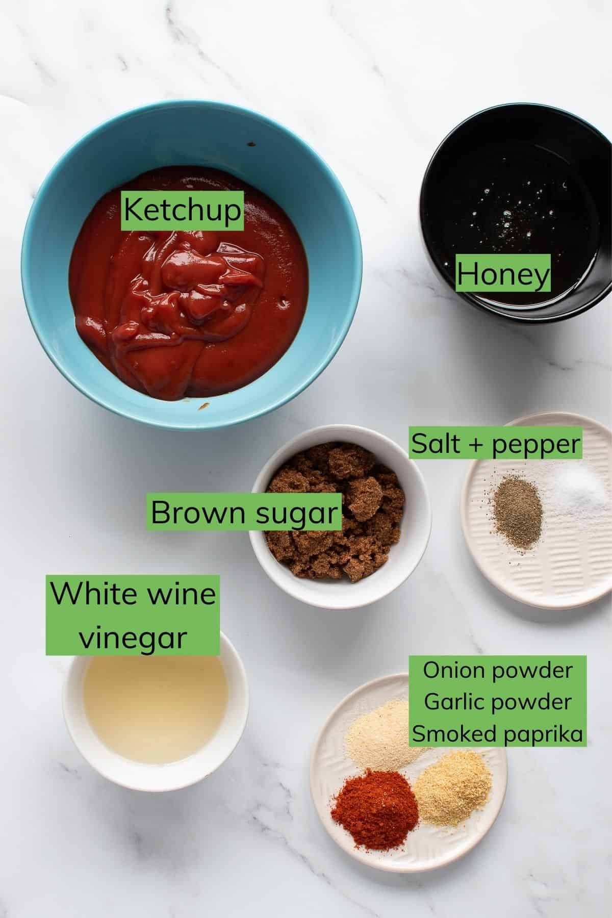 The ingredients for honey BBQ sauce laid out on a table.