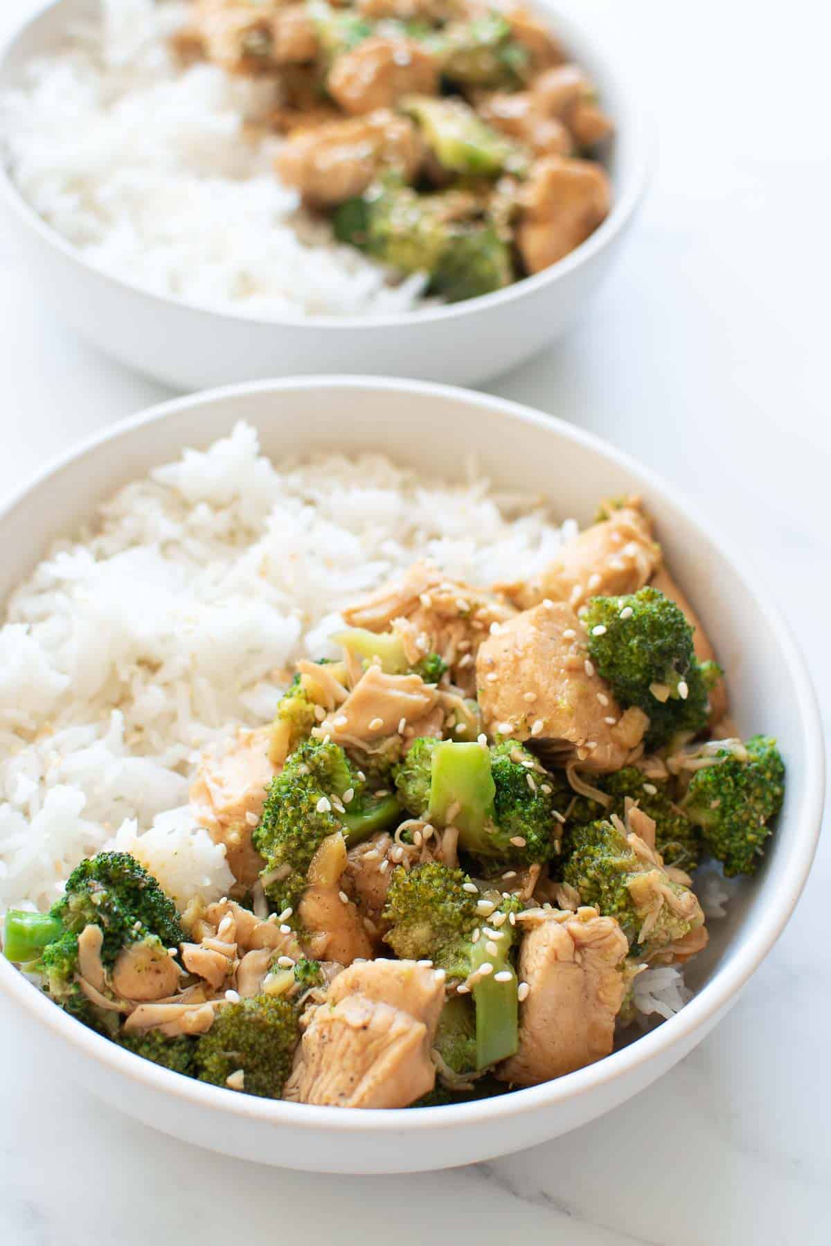 Bowls of pressure cooked broccoli and chicken with rice.