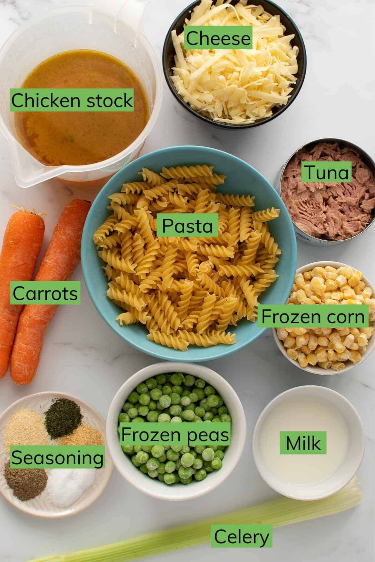 The ingredients required to make instant pot tuna casserole laid out on a table.