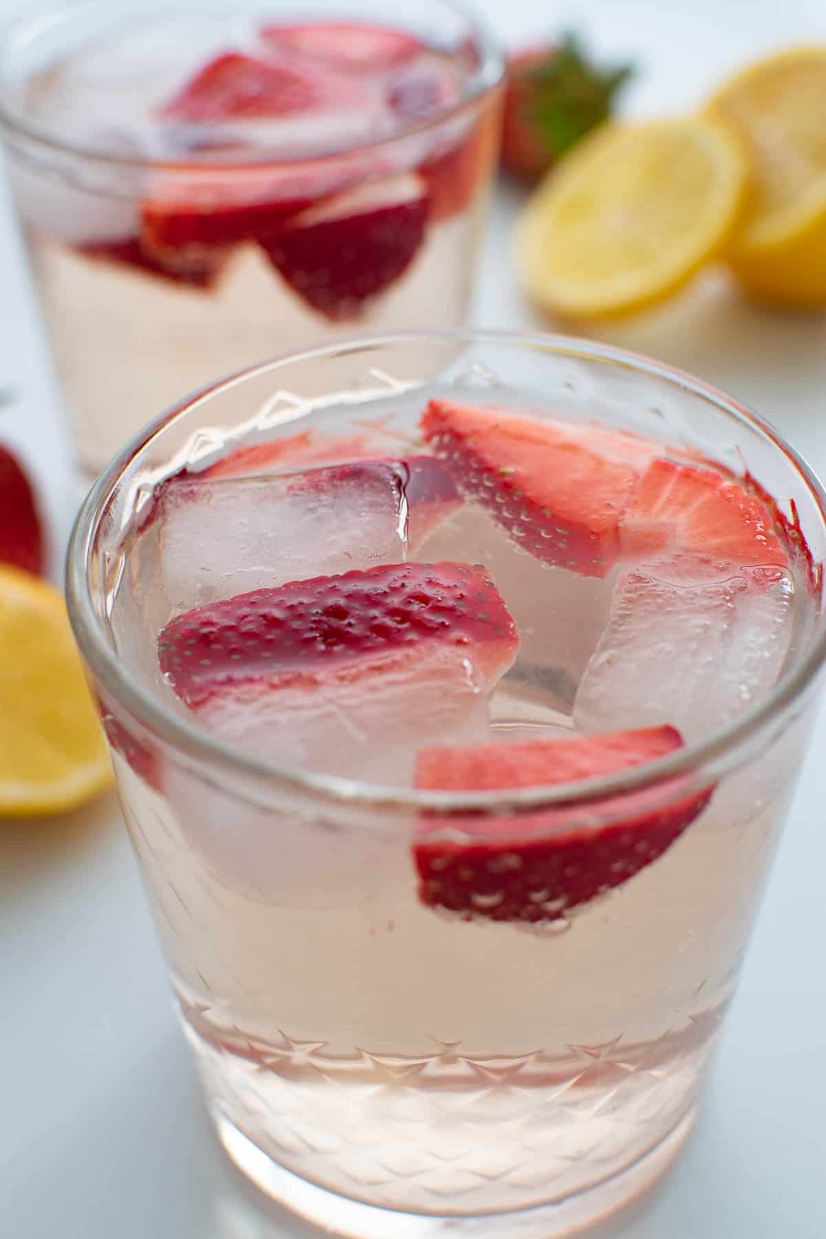 Close up of a glass of rose spritzer.