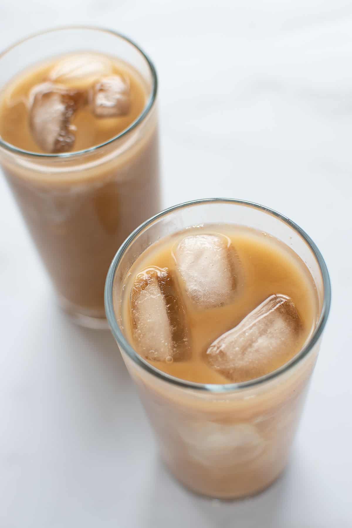 Close up of iced coffee with ice cubes.