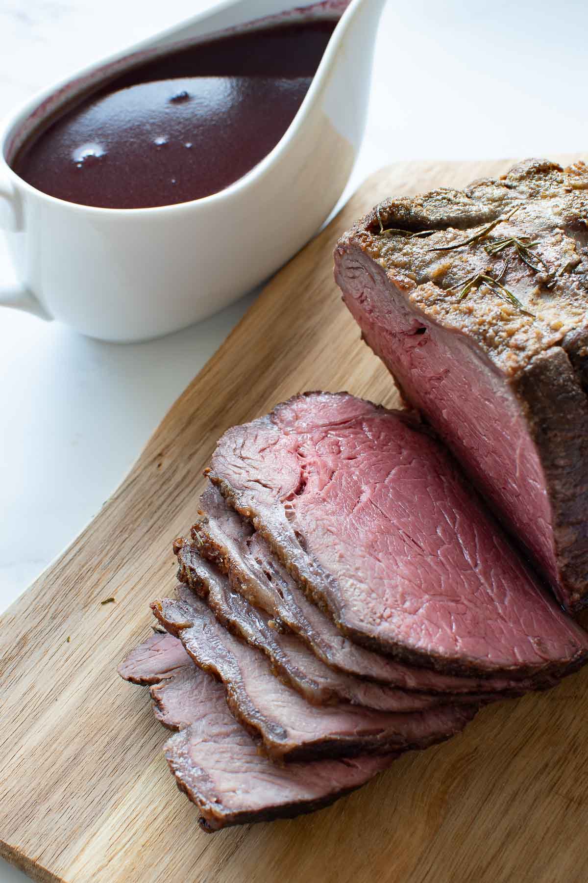 Sliced medium rare roast beef.