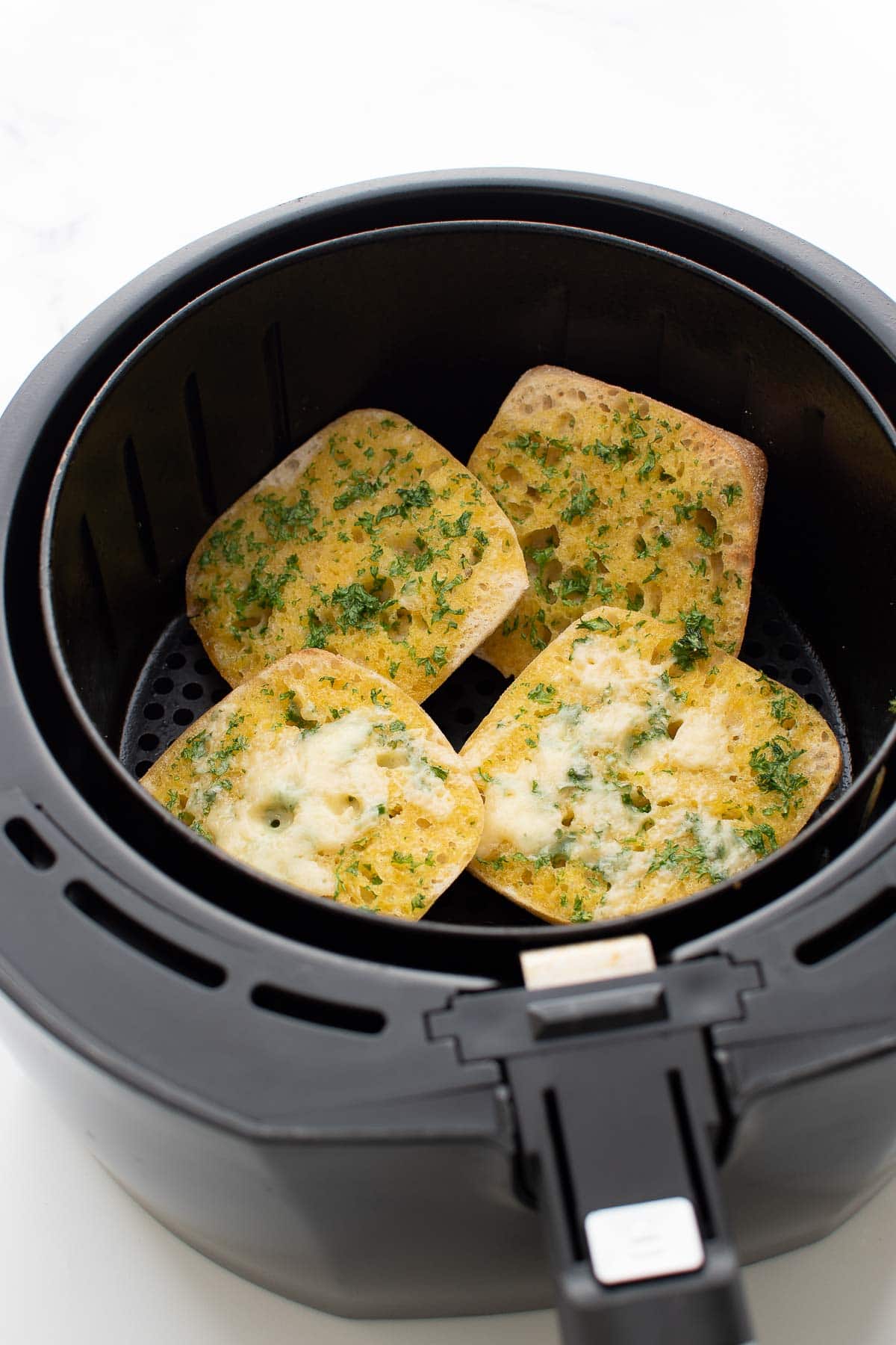 Air fried garlic bread with parsley.