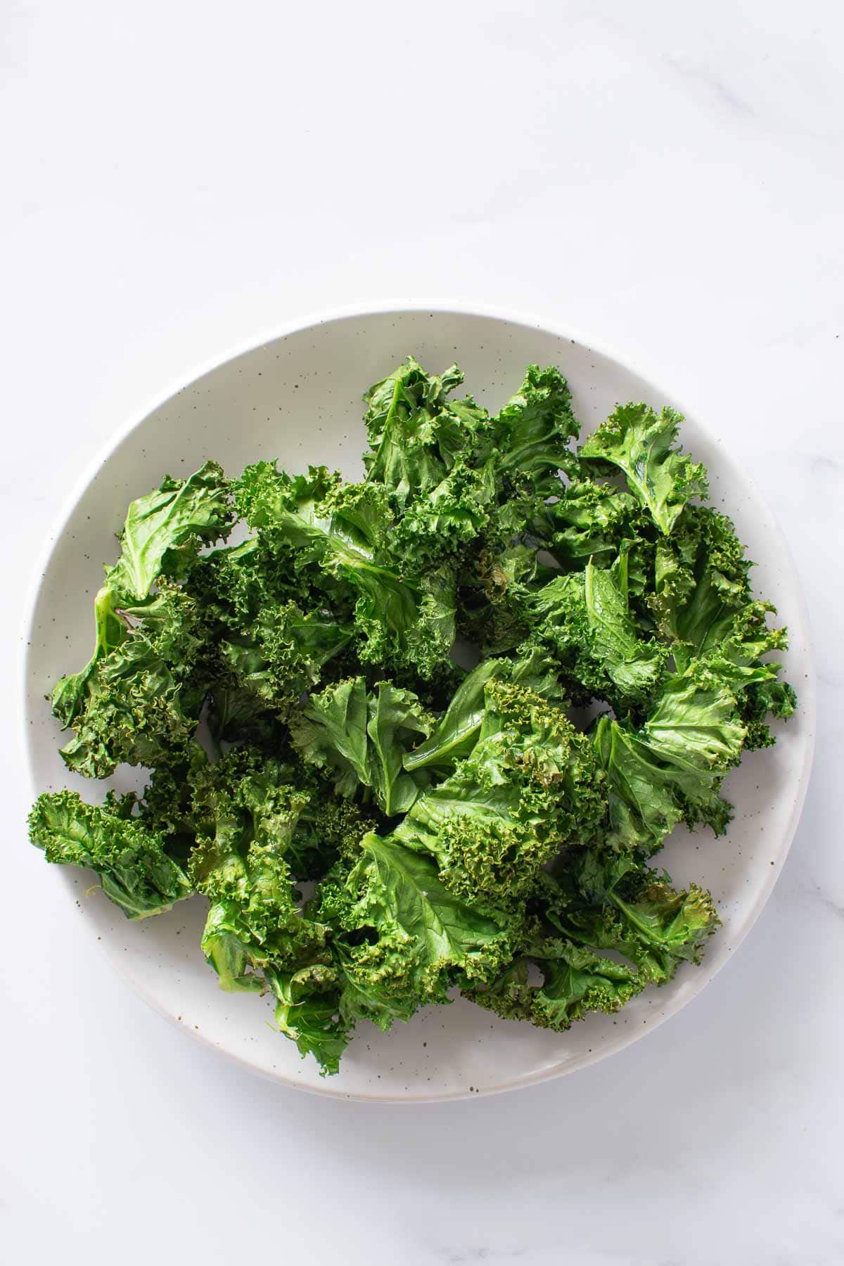 Air Fryer Kale Chips on a plate.