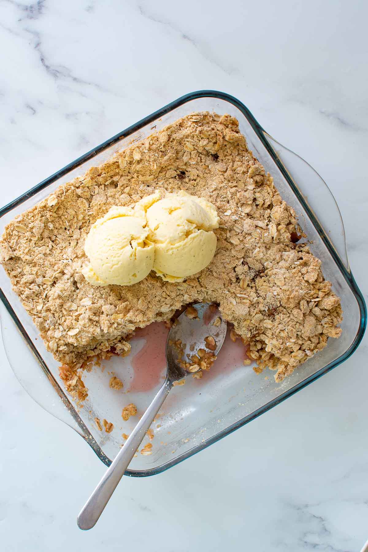 Apple and plum crumble with ice cream.