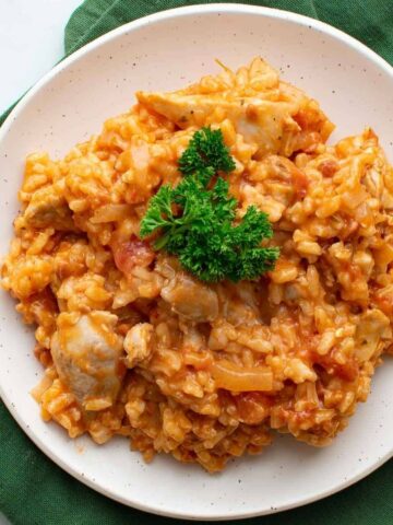 Chicken and chorizo risotto on a plate.