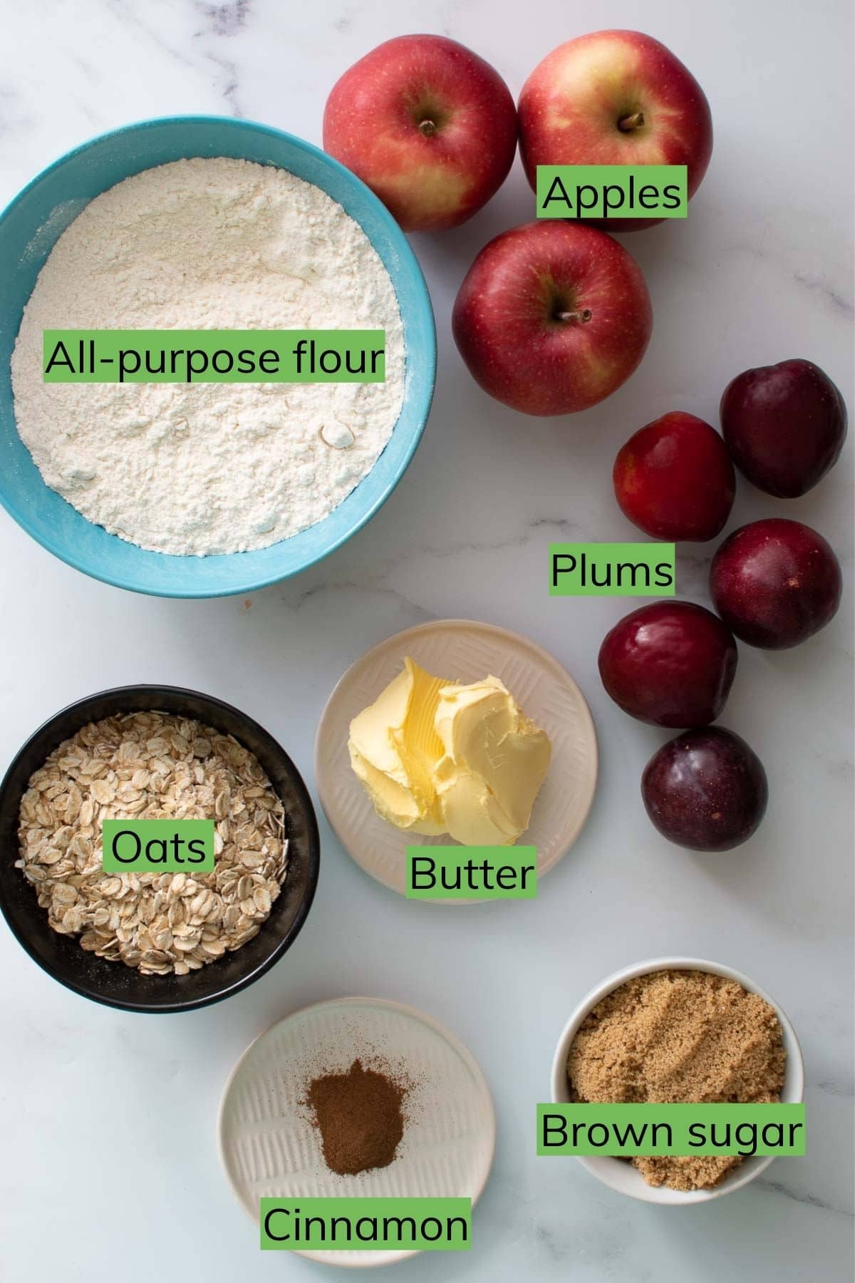 The ingredients needed to make apple plum crumble.