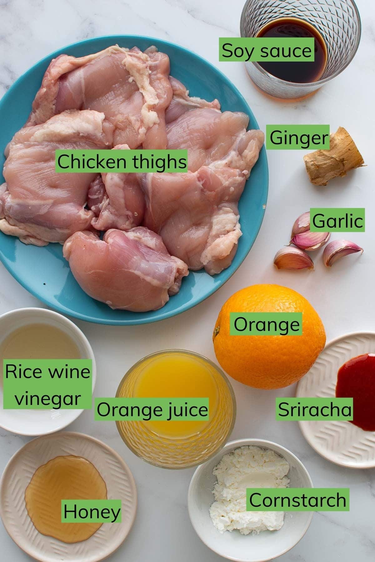 Ingredients for Instant Pot Orange Chicken laid out on a table.