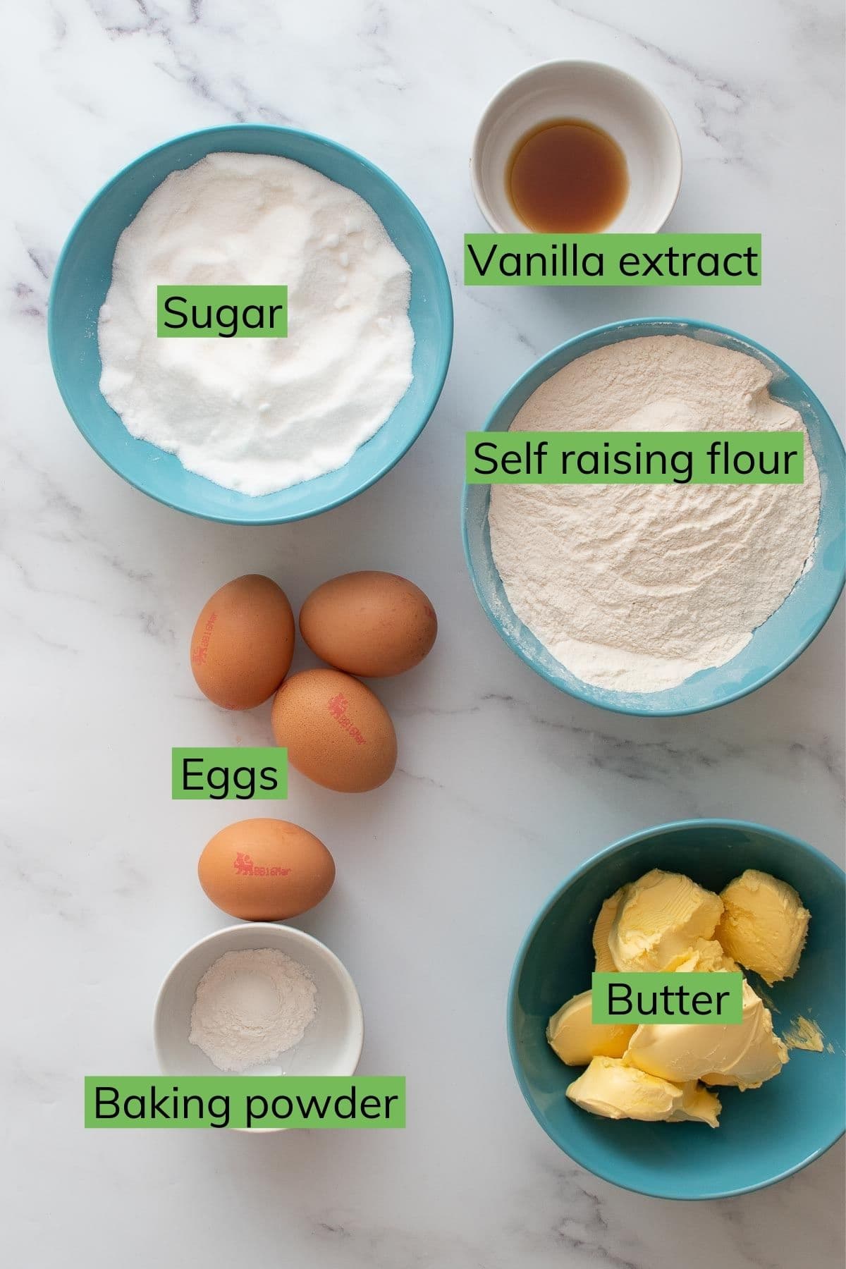 The ingredients needed to make vanilla sponge cake.