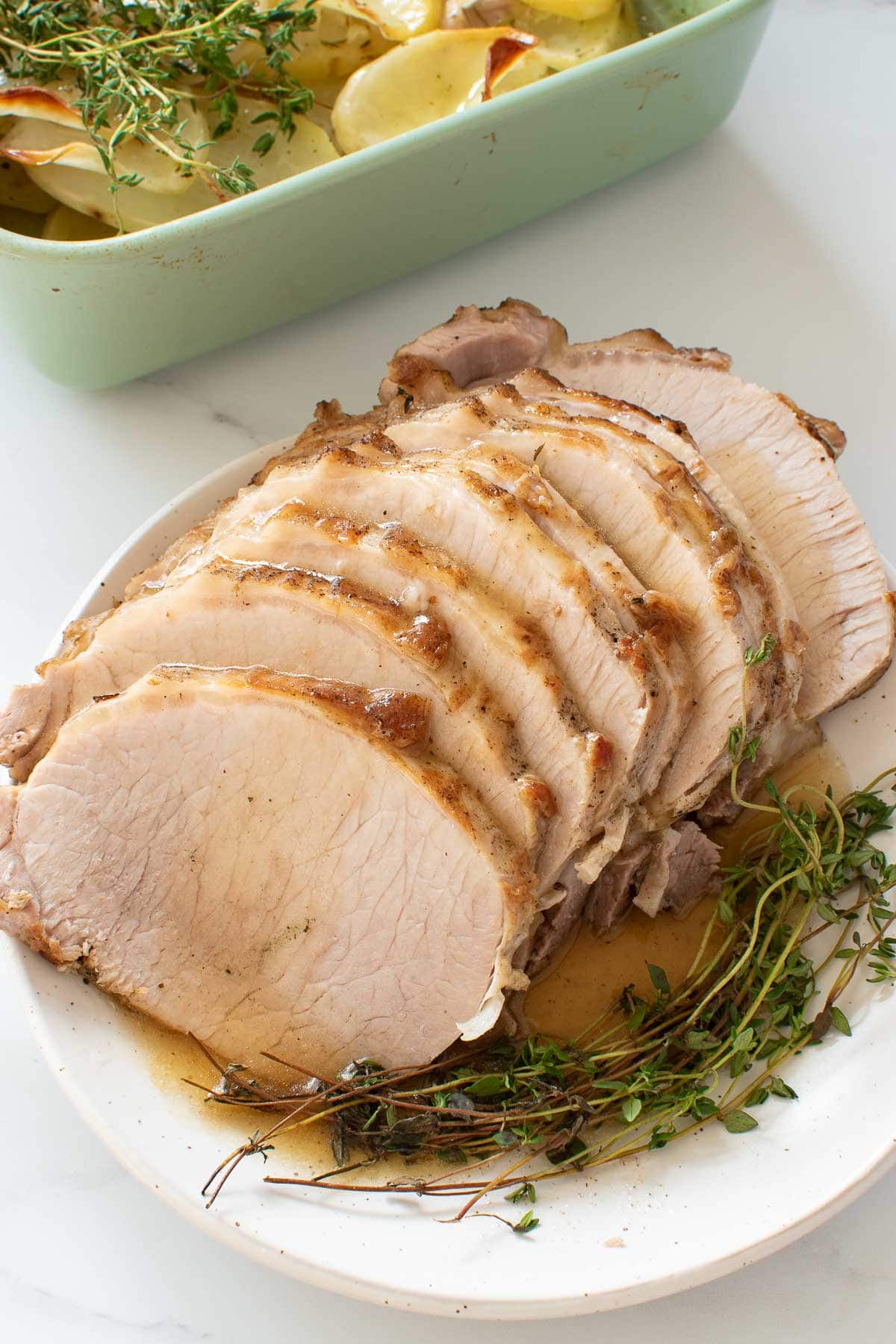 Instant pot pork roast with thyme, gravy and potatoes.