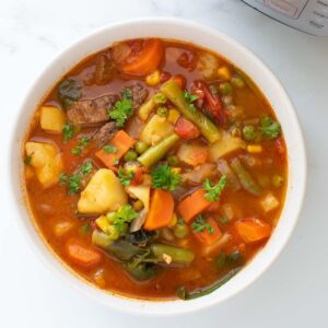 Instant Pot vegetable beef soup in a bowl.