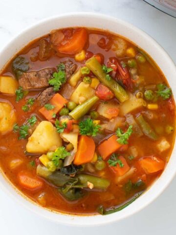 Instant Pot vegetable beef soup in a bowl.