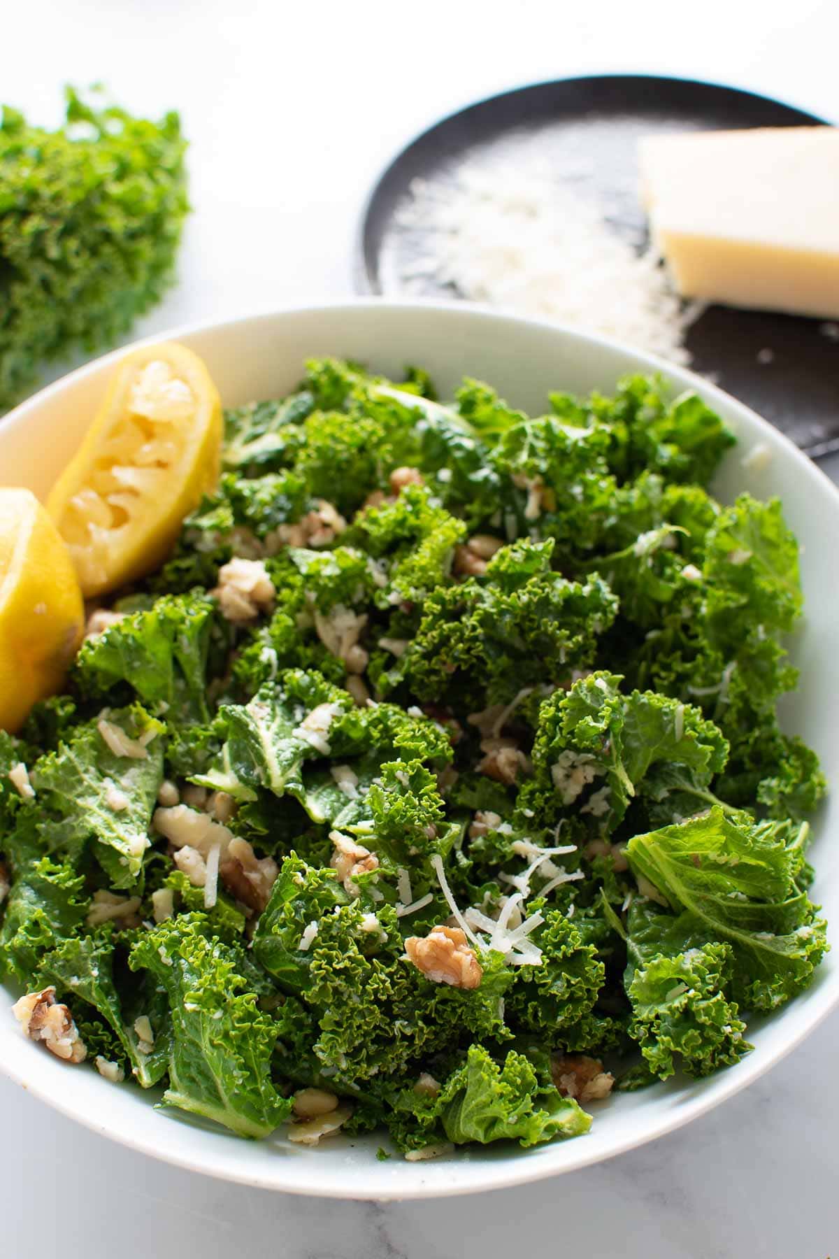 Kale salad with nuts, parmesan and lemon juice.