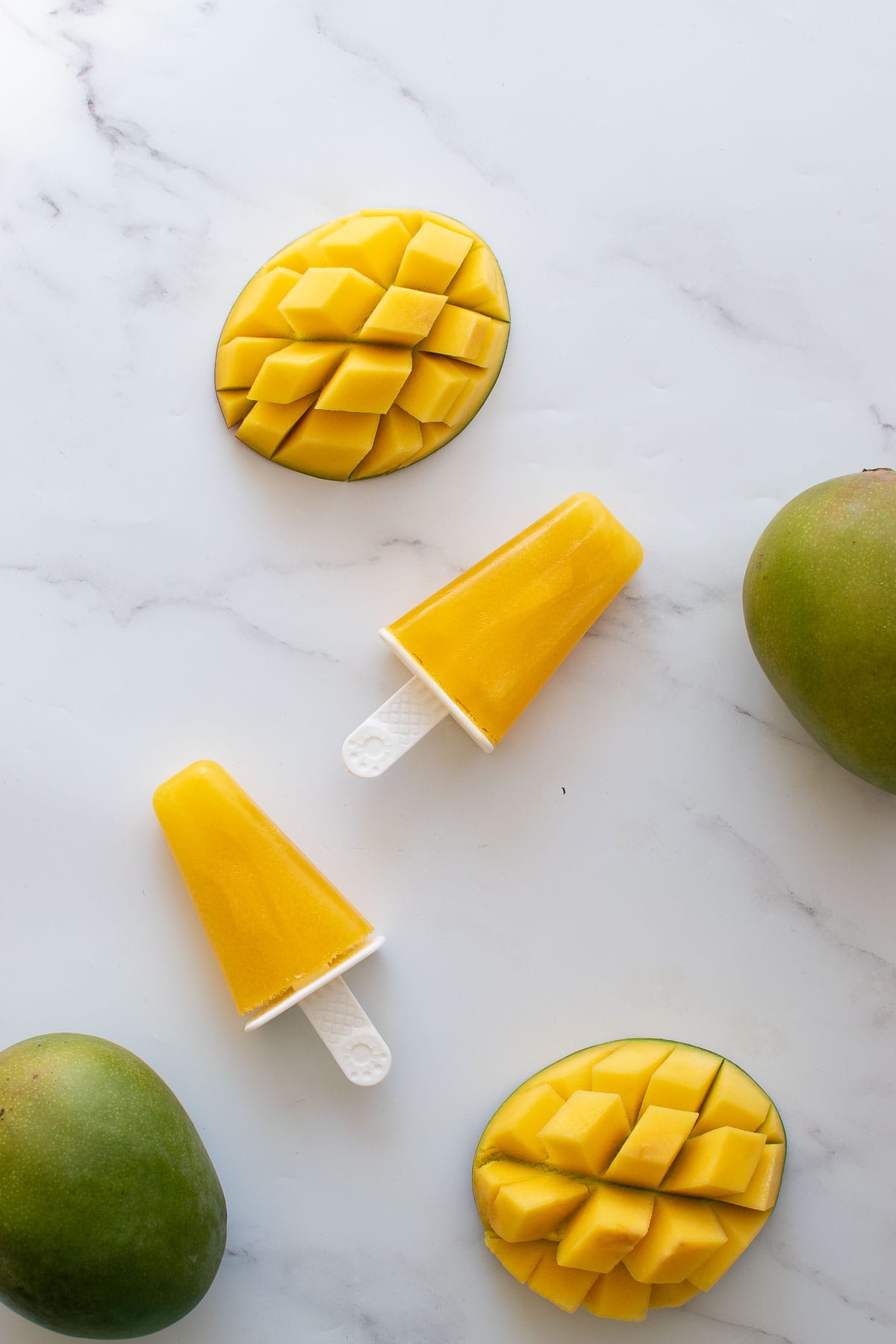 Mango ice lollies and mango.