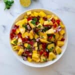 Pineapple mango salsa with cilantro and lime.