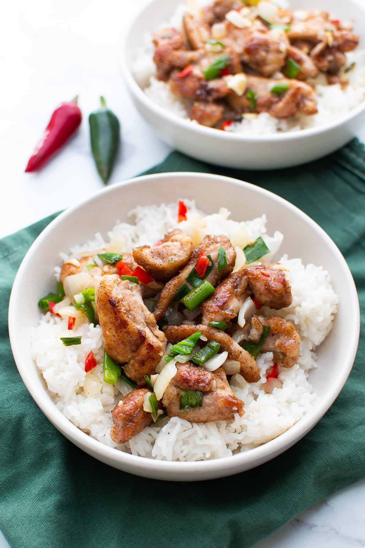 Pan fried chicken thighs with salt and chili.