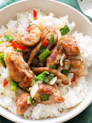 Salt and pepper chicken with rice.