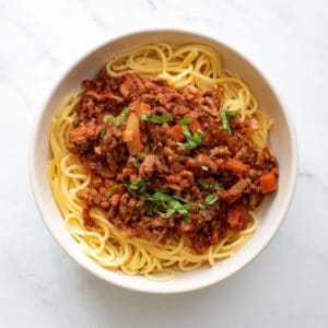 Slow cooker bolognese with spaghetti.