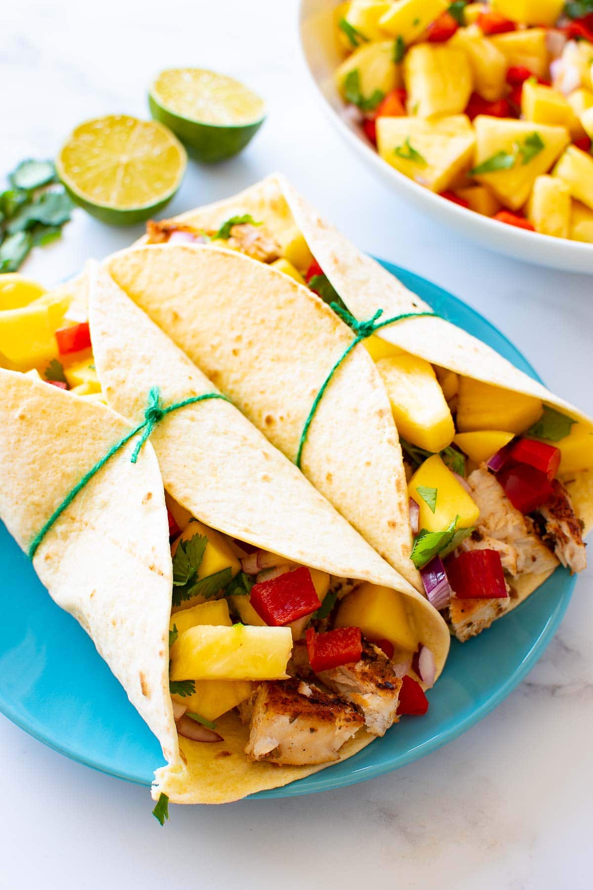 Tacos with blackened swordfish and mango pineapple salsa.