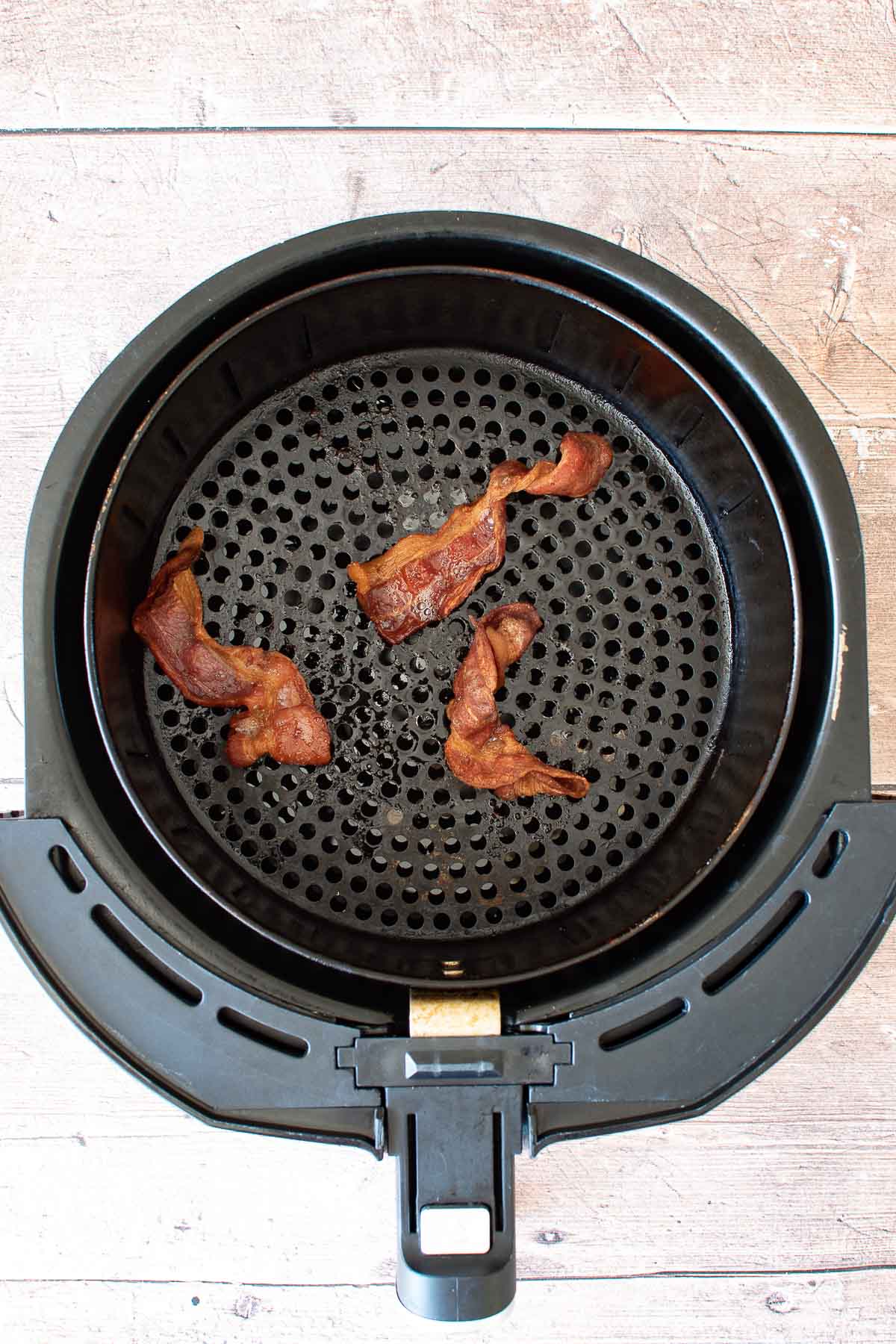 Cooked bacon in air fryer.