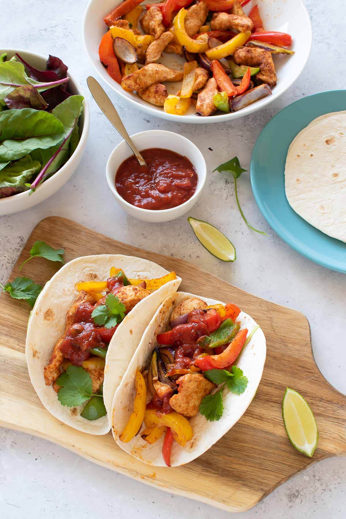 Two air fryer chicken fajitas.