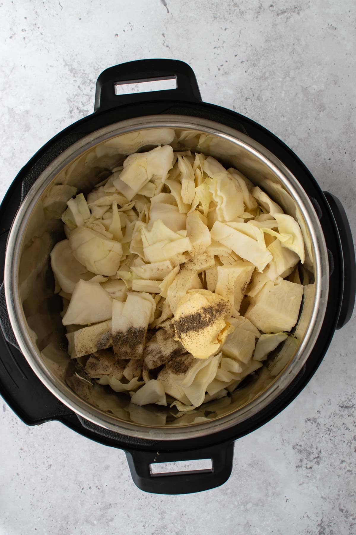 Cabbage and butter in an Instant Pot.