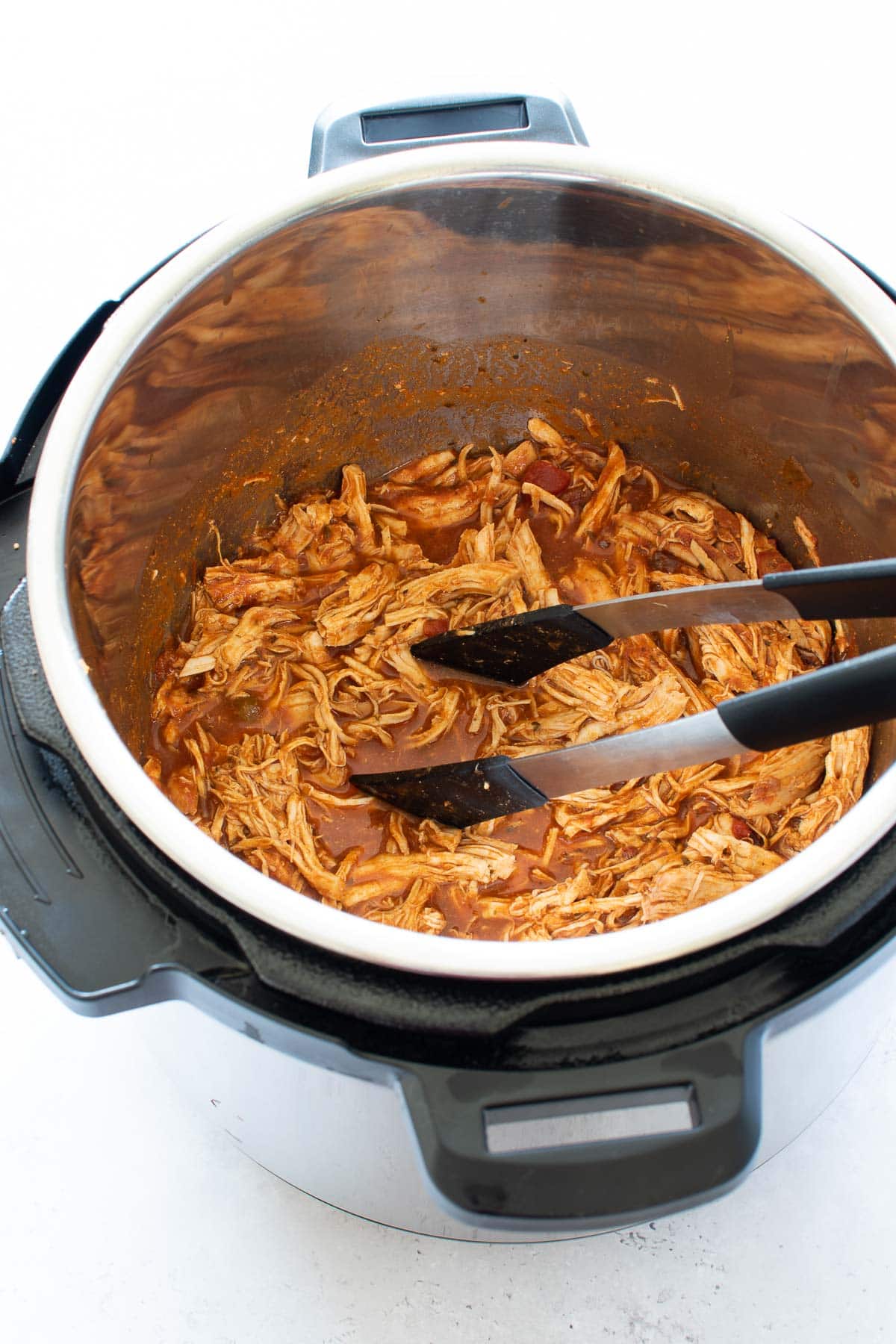 Shredded salsa chicken in the Instant Pot.