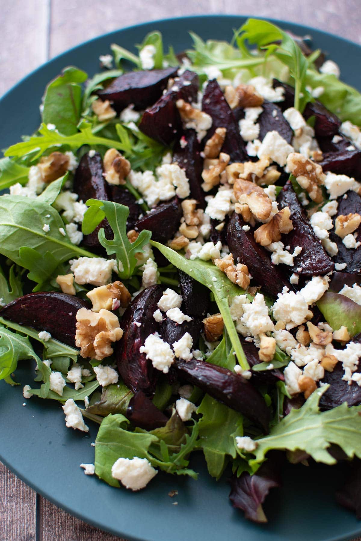 Close up of a salad with feta cheese and roasted beetroot.