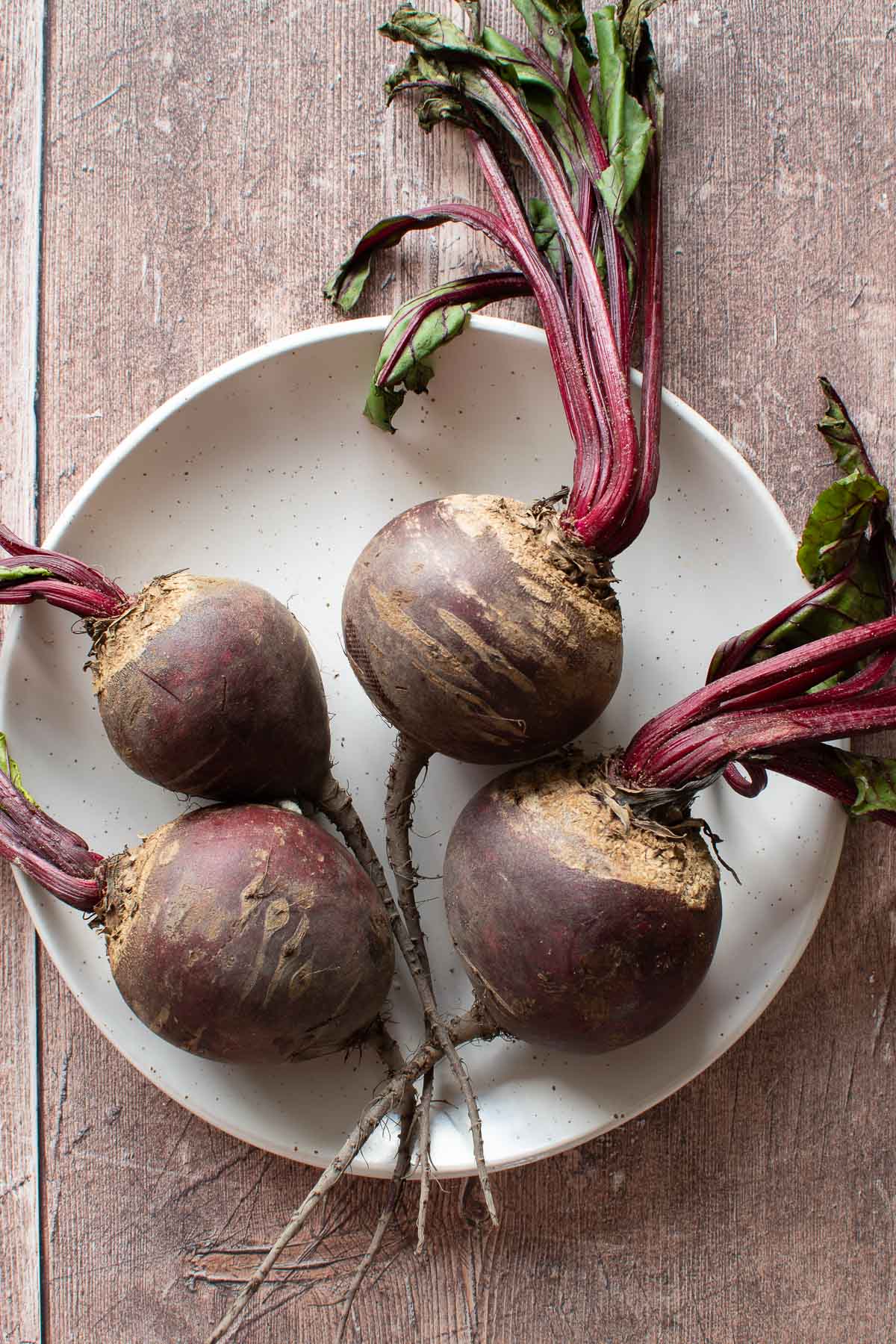 Whole beetroot on a plate.