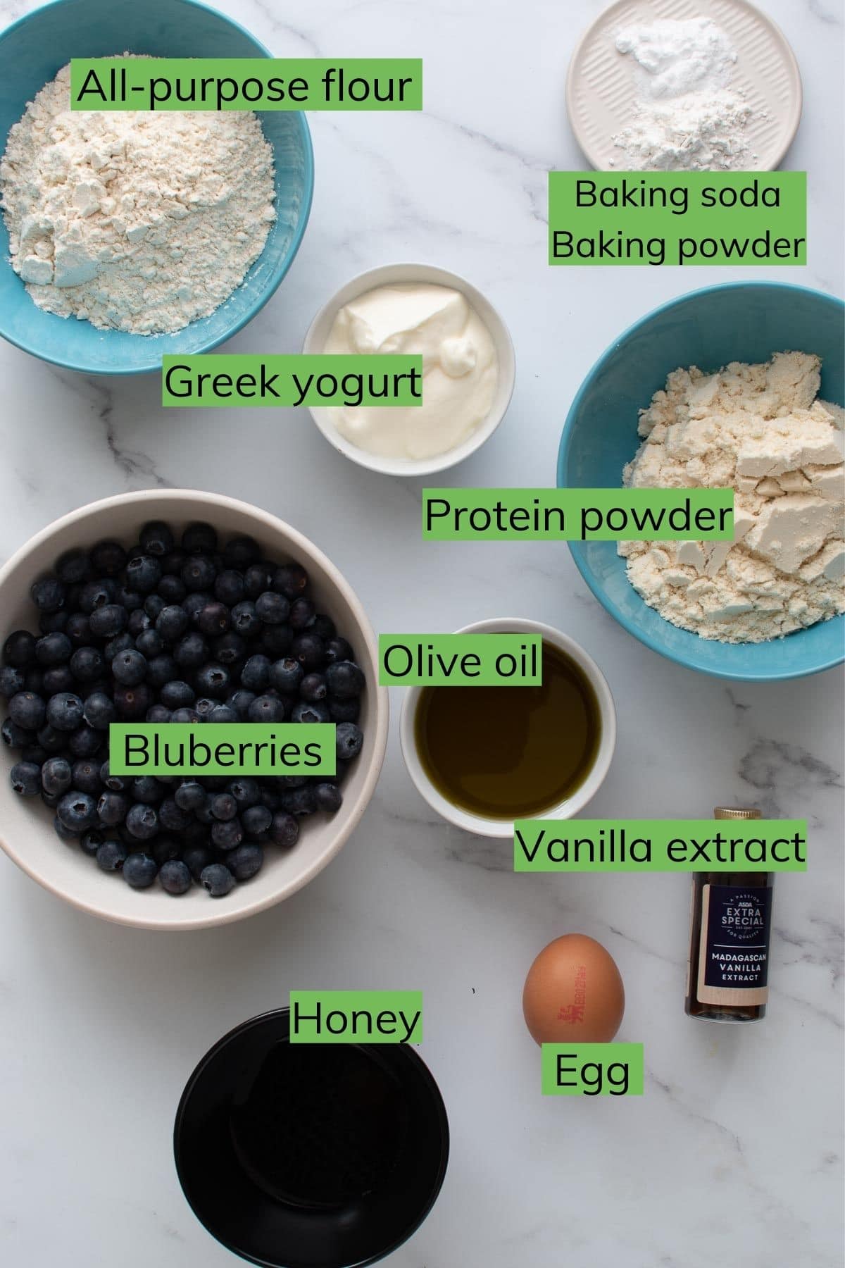 Ingredients needed to make protein muffins with blueberries.