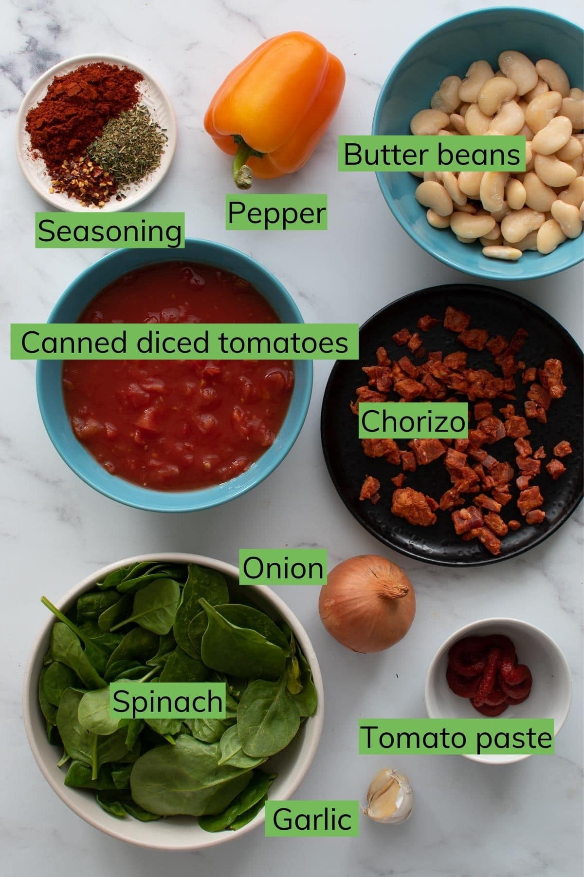 Ingredients needed to make chorizo butter bean stew.