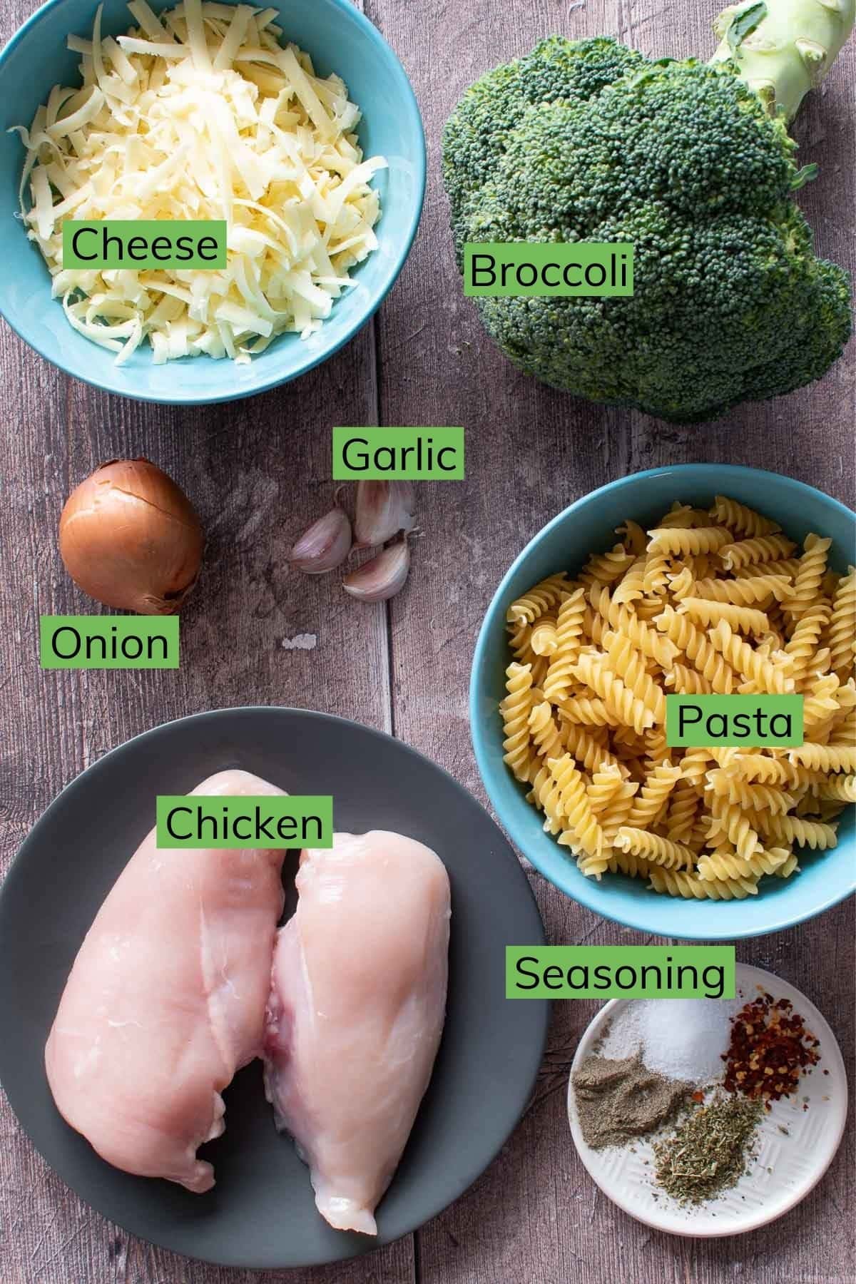 Ingredients needed to make pasta with chicken and broccoli.