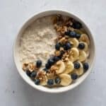 Protein overnight oats with banana, blueberries and walnuts.