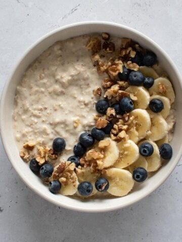 Protein overnight oats with banana, blueberries and walnuts.