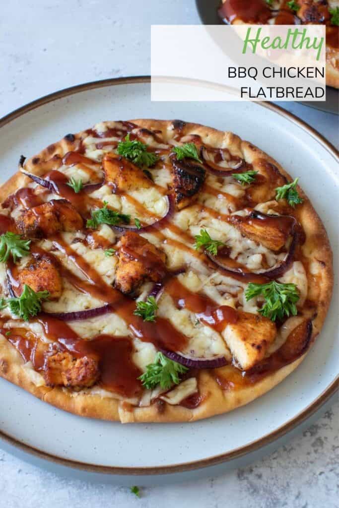 Flatbread with BBQ chicken on a plate.