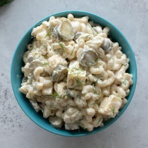 A bowl of dill pickle pasta salad.