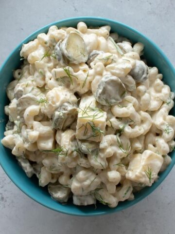 A bowl of dill pickle pasta salad.