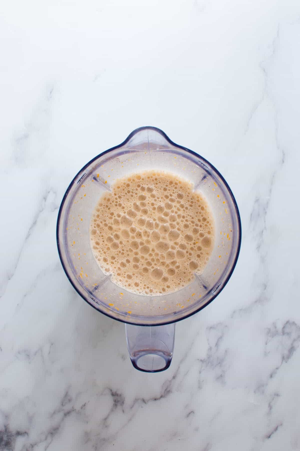 Chilled pumpkin latte in a blender.