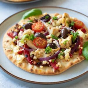 Mediterranean flatbread on a plate.