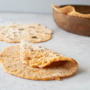 A folded flatbread on a table.