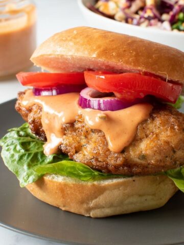 Crispy chicken burger with burger sauce.